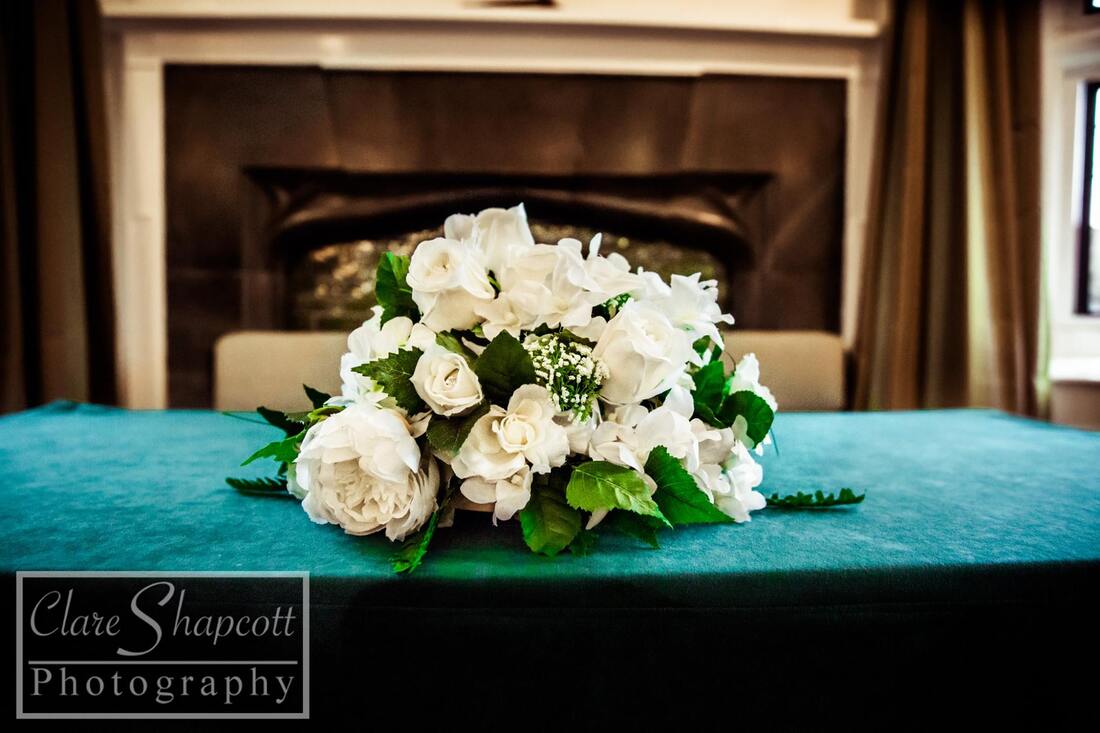Beautiful wedding bouquet on green felt tabletop