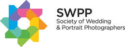 Rainbow aperture logo of the society of wedding and portrait photographers